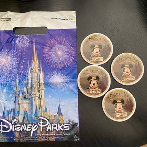 4 Storytellers Cafe lapel pin buttons and Disney Parks bag